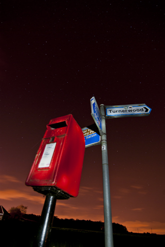 post box taken at night with stars