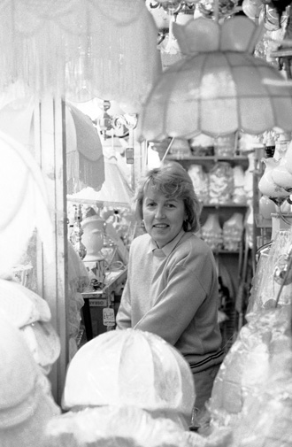 lady selling lighting at a market stall