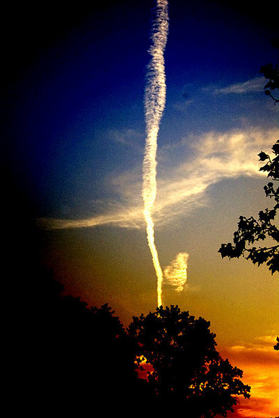 Sunset with contrails