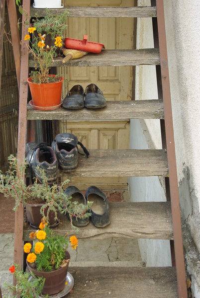 Stairs,dirty shoes & flowers