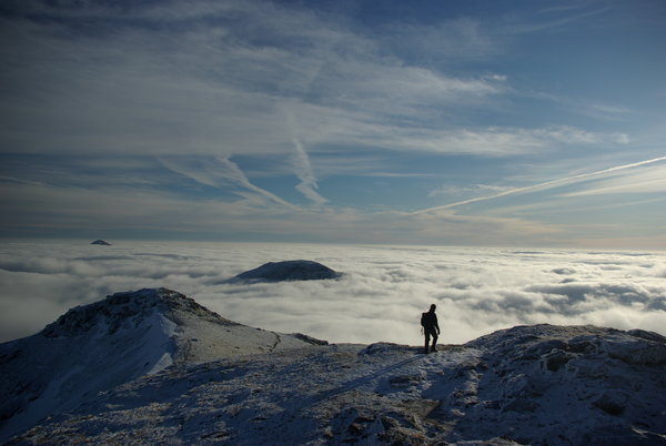 Standing Above the Clouds
