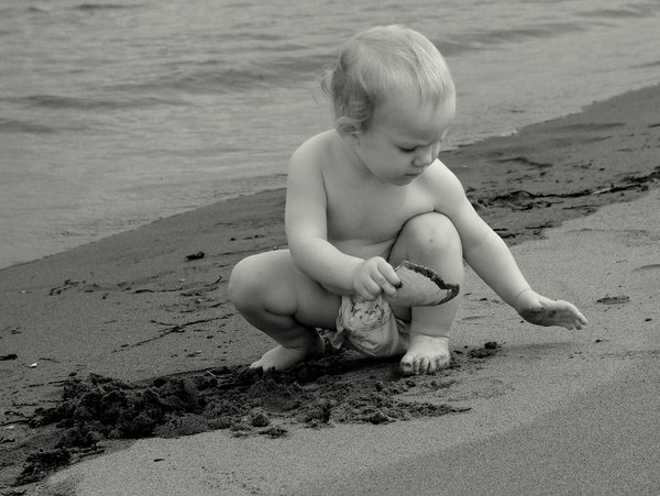 Baby At The Sea Shore