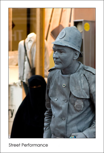 Street Performer and Onlooker