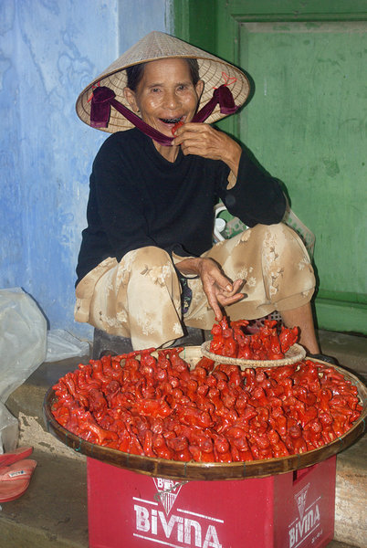 Lady Selling Pottery Whistles, Hoi An, Vietnam