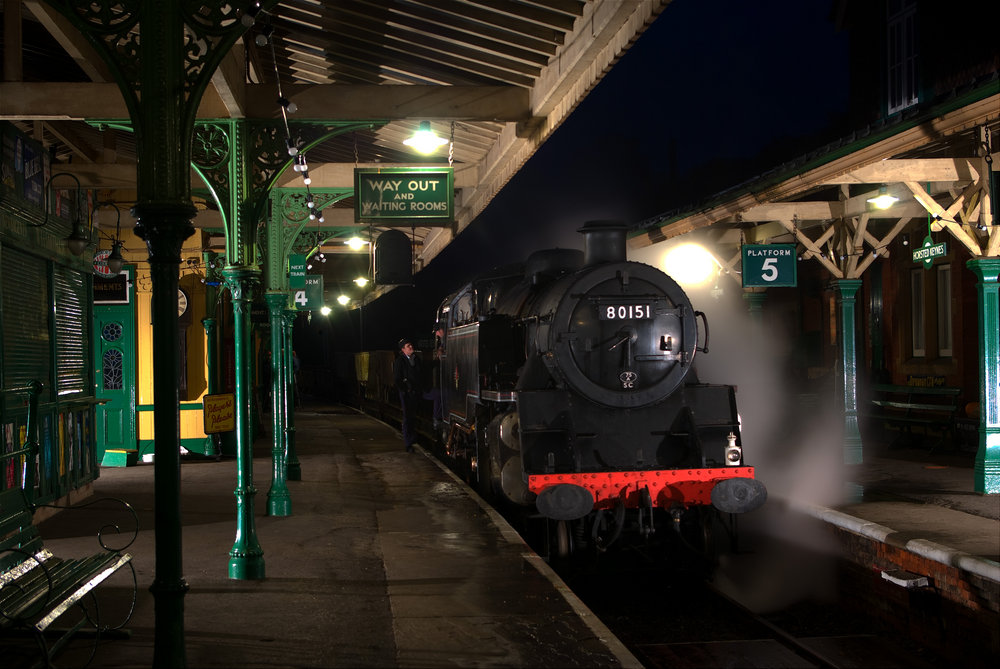Steam at night and under the lights.