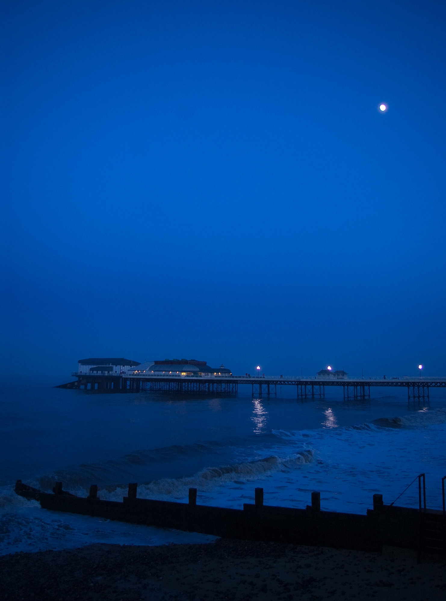 Sunset over Cromer pier New Year's eve 2009