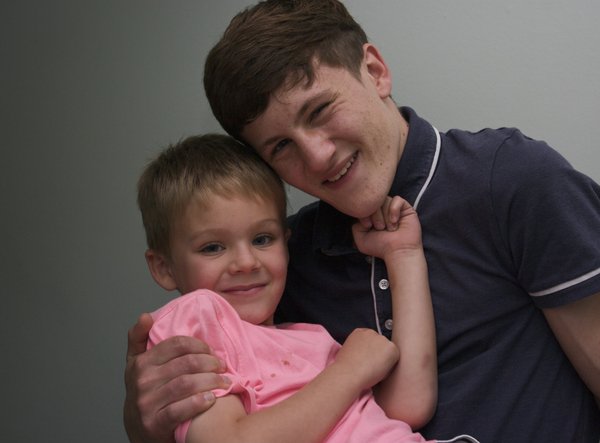 Cousins embrace