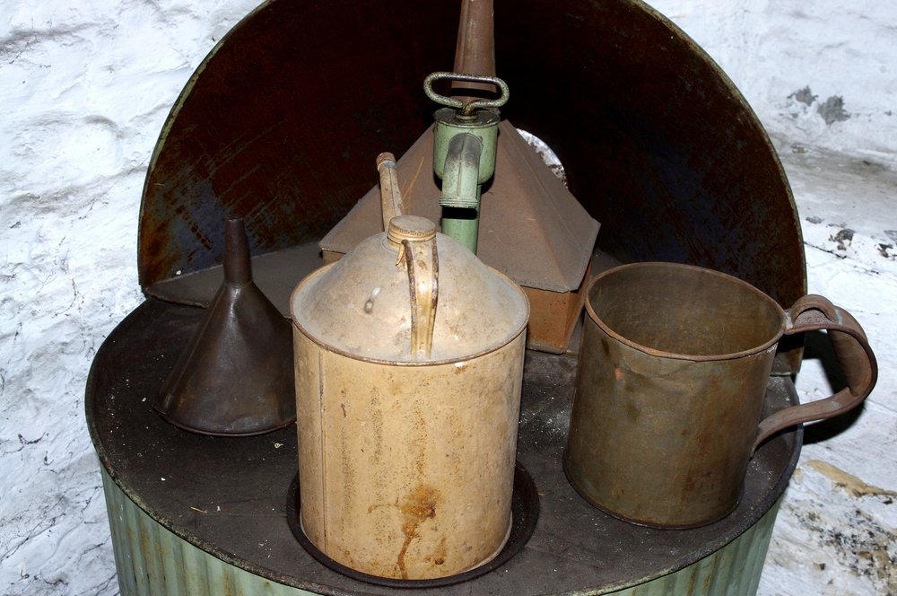 cans, tin mugs, oil tins.