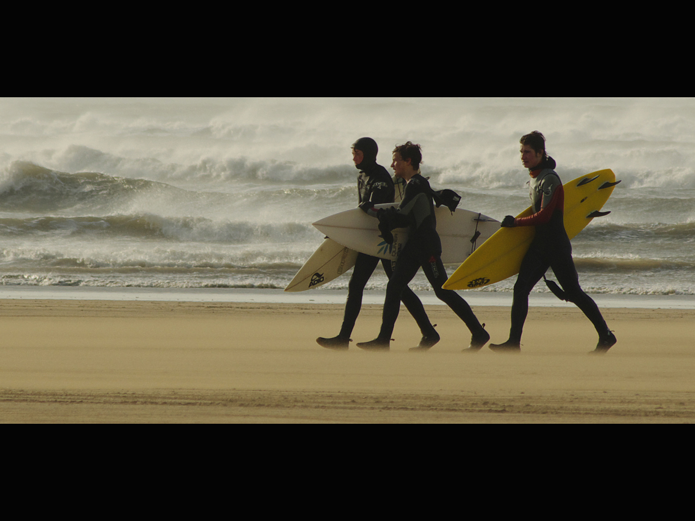 Trio of Surfers