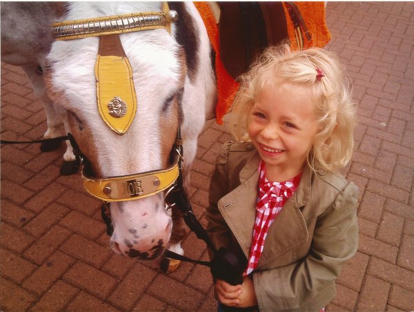 My youngest grandaughter with Joe...