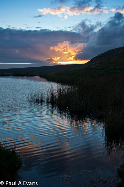 Sunset reflections in Mermaids Pool, Kinder Scout