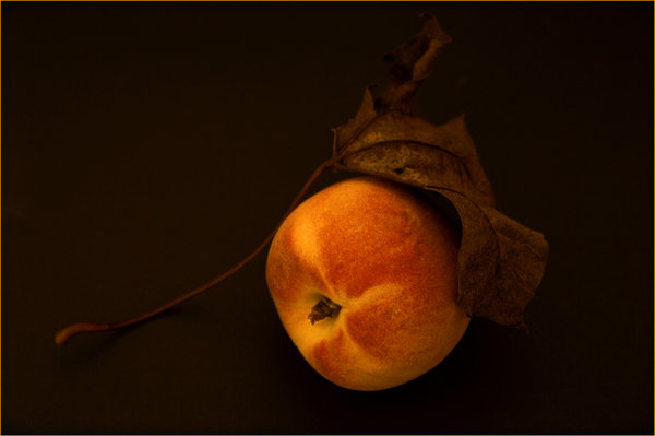 Peach With Autumn Leaf
