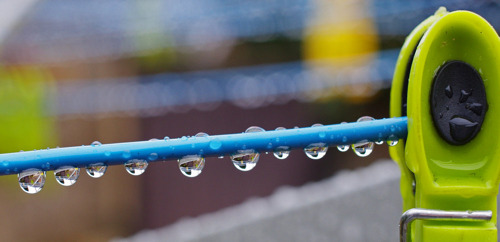 Rain drops on washing line.