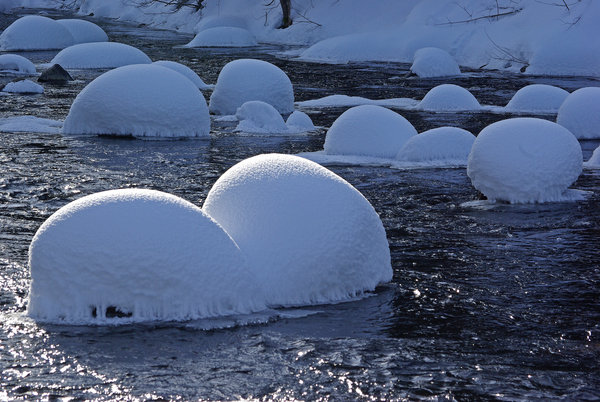 Rapids releasing from the power of winter