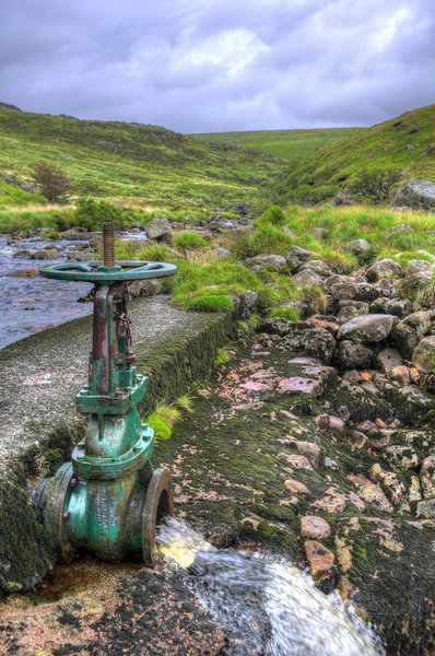 Outlet pipe at the River Tavy high on Dartmoor