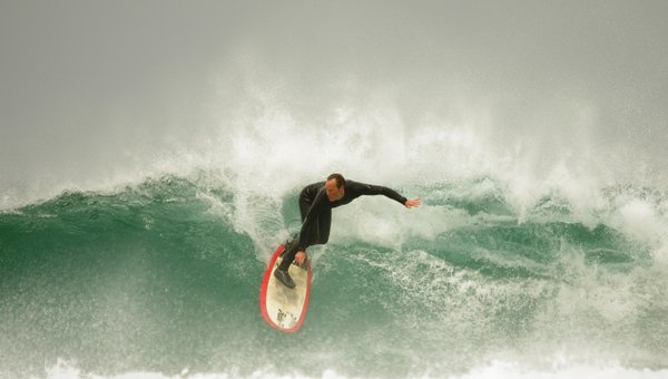Surfing at Holywell Bay, Cornwall