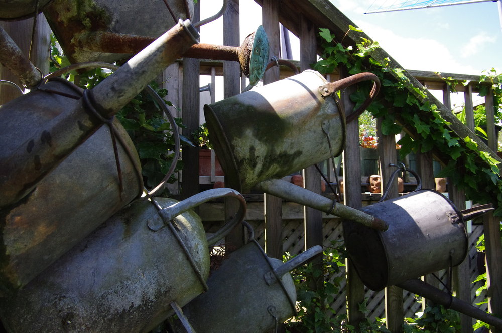 Watering cans.