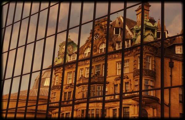 Old building reflected in new one!