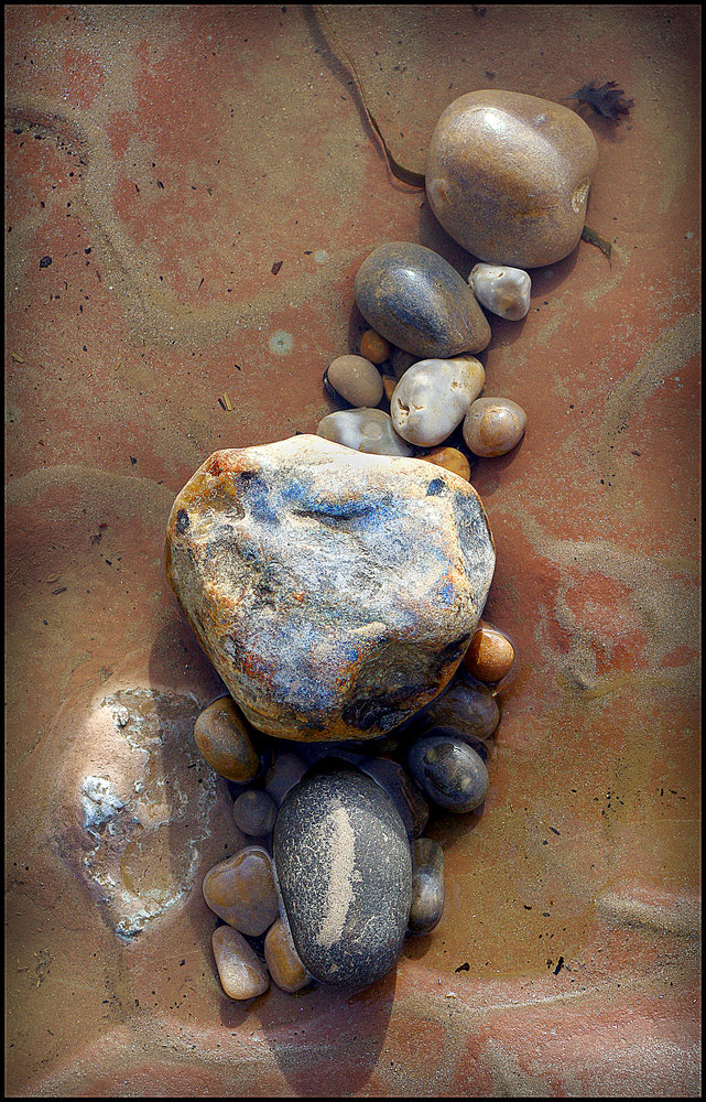 Pebbles on a Red Rock