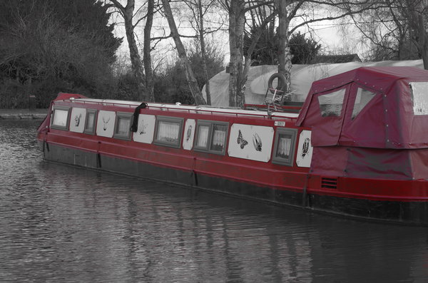Dull red narrow boat