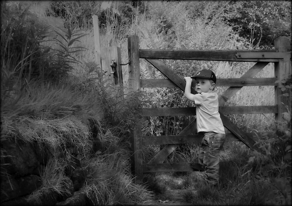 A boy and an open gate ...