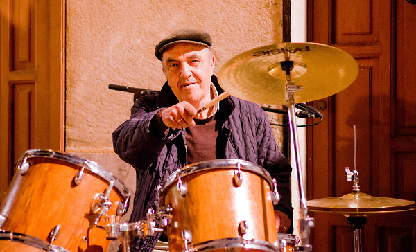 PLAYING THE DRUMS