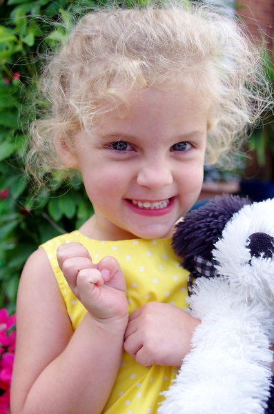 Madison and her toy dog