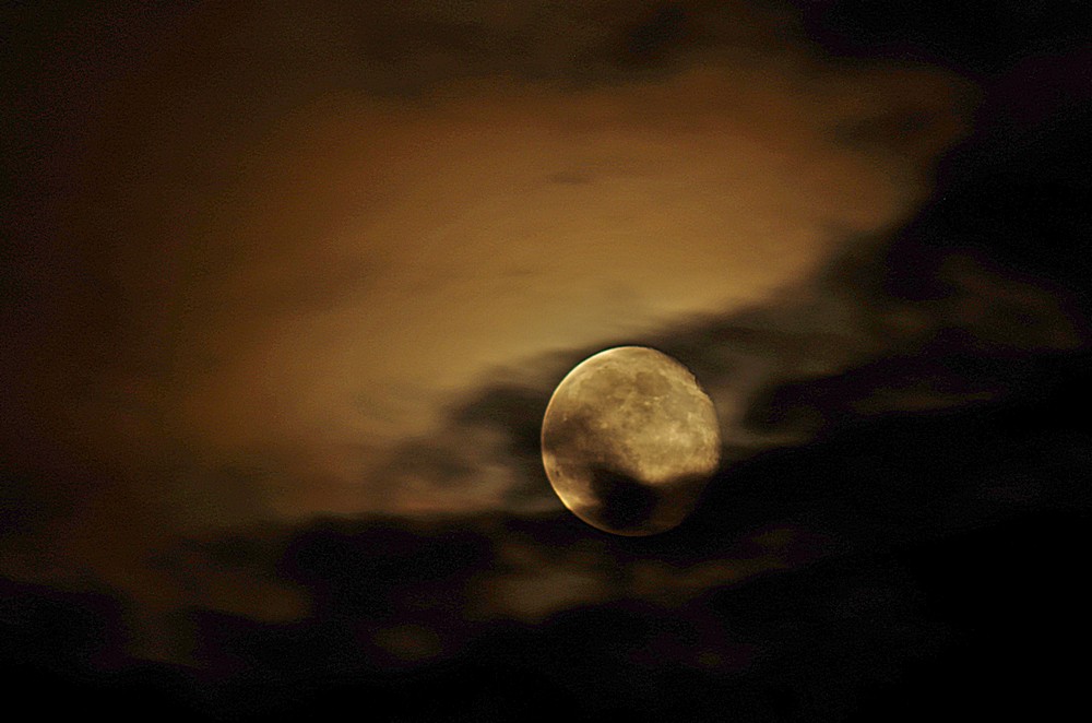 a cloudy moon