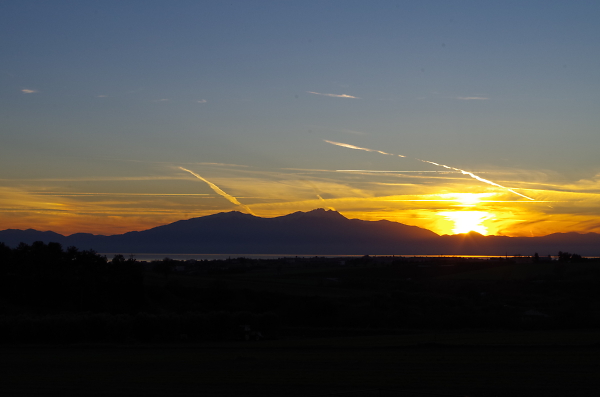 As the sun sets over Mount Olympus
