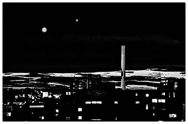 The Earth's two moons - the day and night moon meet up