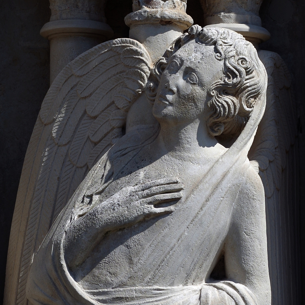 Exeter Cathedral west facade Angel detail