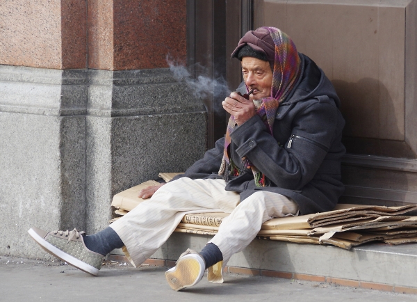 Beggar outside The Blind Beggar Public House in Whitechapel London