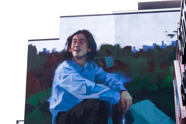Giant Mural Man Sitting