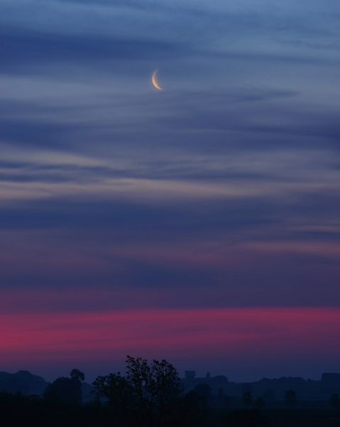 Sunrise or moonset.