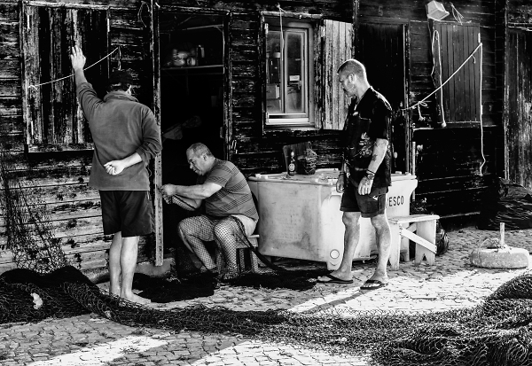 Mending the fishing nets.