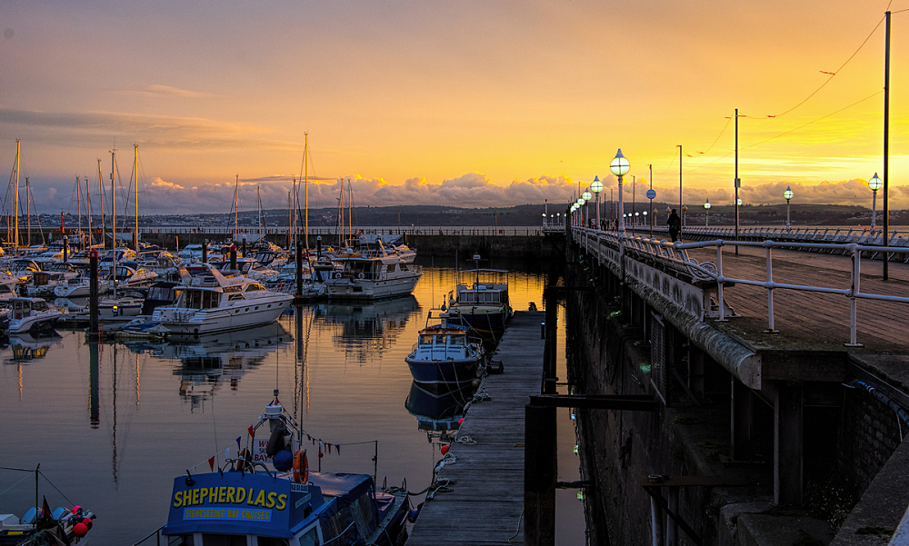 sunset on Torquay Pier and Harbour