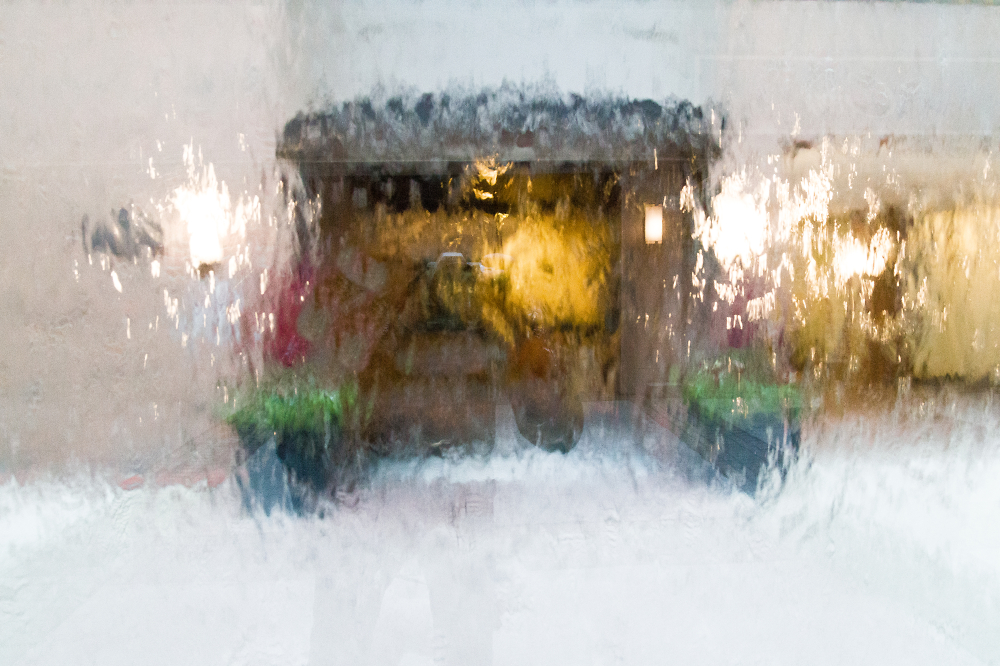 Photographing Doorway Through Waterfall