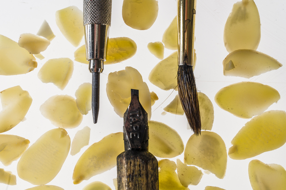 Tools and Almond Slices: A lens Test