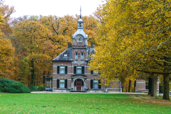 The old house in autumnleaves