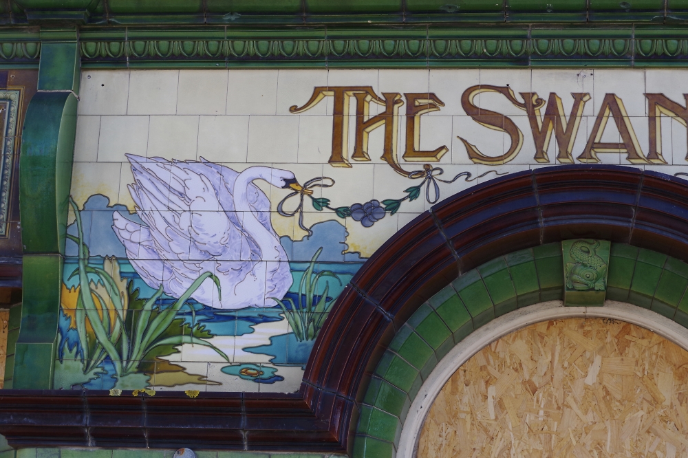 Old tiles on another closed pub.