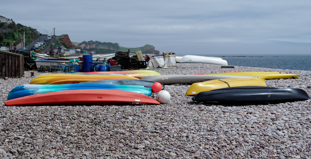 Resting Boats, Kayaks and Paddle Boards