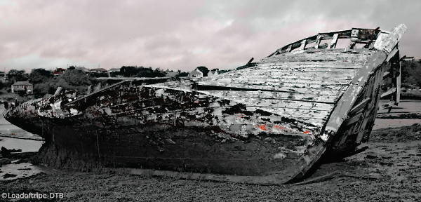 Wreck slowly decaying.