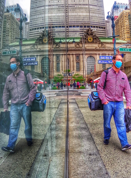 Man�s reflection on Park Ave
