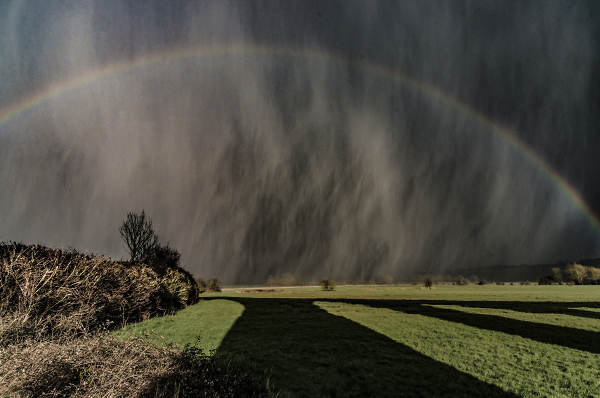 Hail, rainbow and the shadow of Harringworth Viaduct.