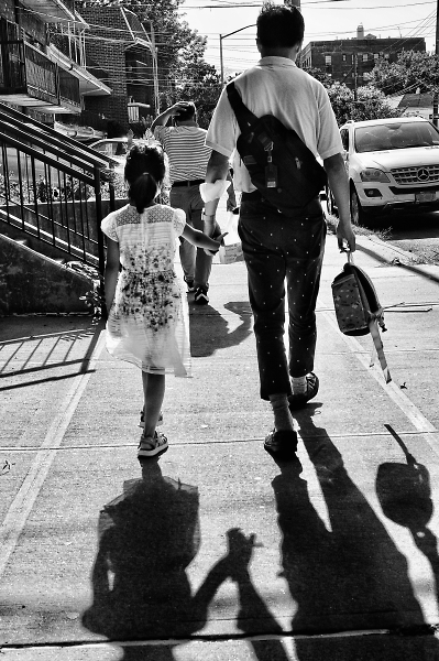Father and daughters shadow