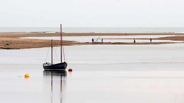 Fishing at low tide.