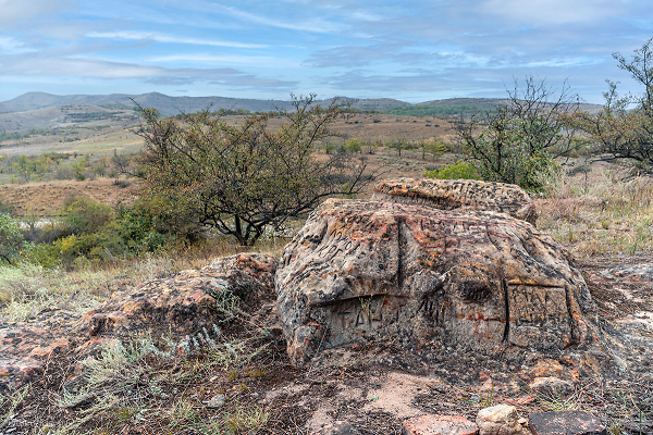 Modern petroglyphs of barbarians