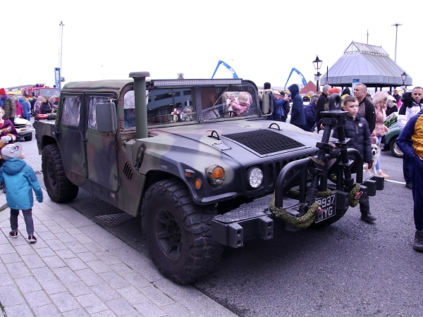 A Hummer on a packed Poole quay.