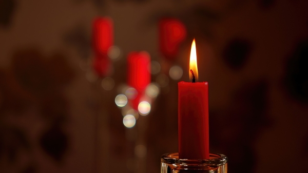 One burning candle