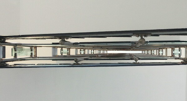 Receding glass, concrete and steel.